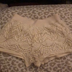 White lace shorts with under shorts.